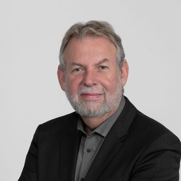 Trevor Dunn, Associate